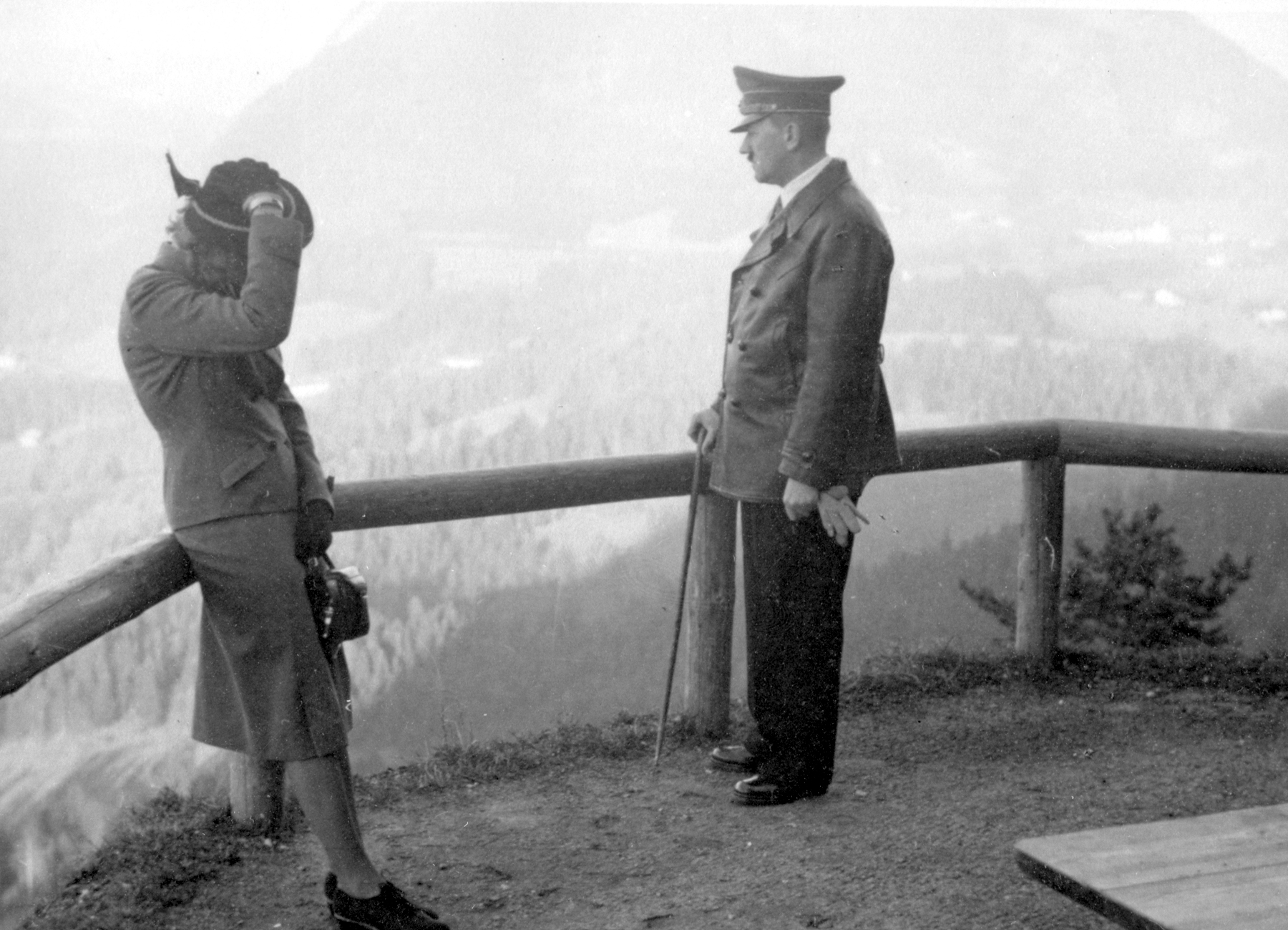 Adolf Hitler and Eva Braun in front of the Teehaus on the Obersalzberg, from Eva Braun's albums